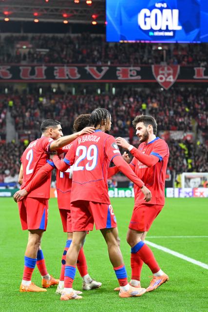 (251022) -- LEVERKUSEN, Oct. 22, 2025 (Xinhua) -- Players of Paris Saint Germain celebrate scoring during the UEFA Champions League group stage 3rd round match between Bayer 04 Leverkusen and Paris Saint Germain in Leverkusen, Germany,  Oct. 21, 2025. (Photo by Ulrich Hufnagel/Xinhua)