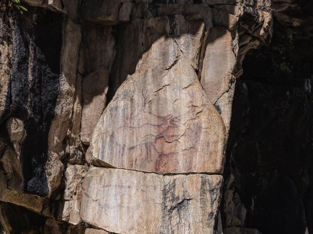 (251022) -- CHENGDU, Oct. 22, 2025 (Xinhua) -- This photo taken on Oct. 21, 2025 shows a rock painting that features deer-shaped images in Garze Tibetan Autonomous Prefecture, southwest China's Sichuan Province. This group of rock paintings in the prefecture dates back about 8,000 years. (Xinhua/Xue Chen)