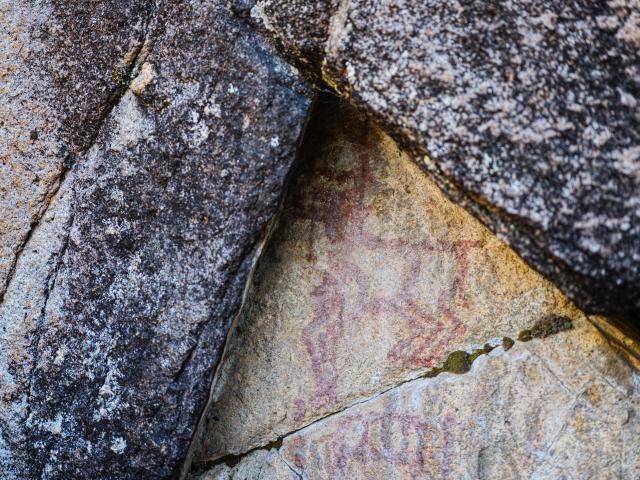 (251022) -- CHENGDU, Oct. 22, 2025 (Xinhua) -- This photo taken on Oct. 21, 2025 shows a rock painting in Garze Tibetan Autonomous Prefecture, southwest China's Sichuan Province. This group of rock paintings in the prefecture dates back about 8,000 years. (Xinhua/Xue Chen)