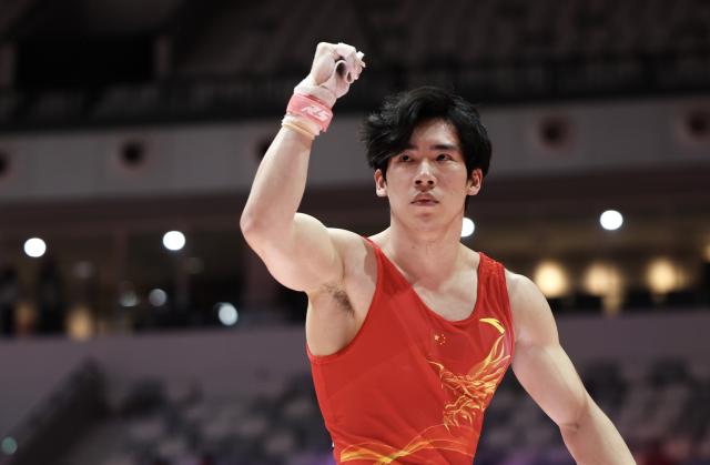 (251022) -- JAKARTA, Oct. 22, 2025 (Xinhua) -- Zhang Boheng of China reacts after the Rings of Men's All-Round Final at the 53rd FIG Artistic Gymnastics World Championships in Jakarta, Indonesia, on Oct. 22, 2025. (Xinhua/Bai Xuefei)