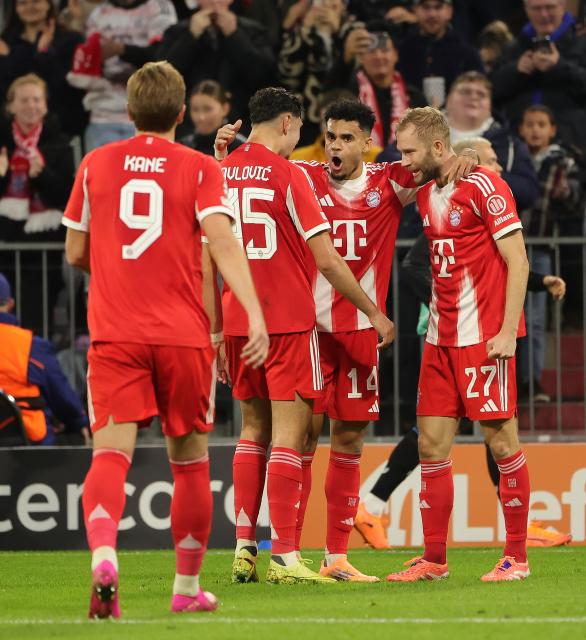 (251023) -- MUNICH, Oct. 23, 2025 (Xinhua) -- Players of Bayern Munich celebrate scoring during the UEFA Champions League football match between Bayern Munich and Club Brugge in Munich, Germany, Oct. 22, 2025. (Photo by Philippe Ruiz/Xinhua)