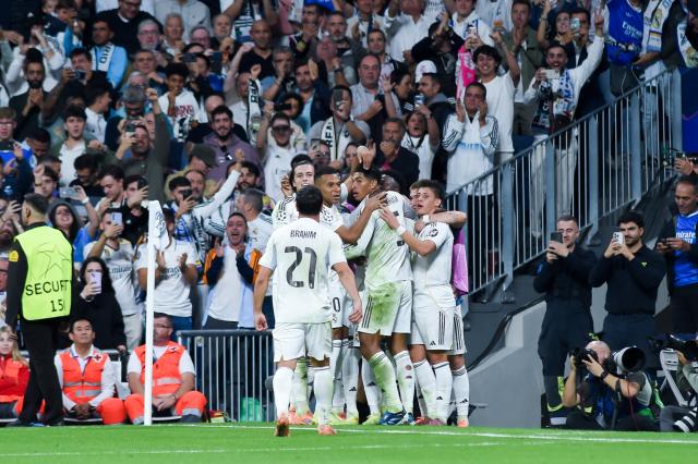 (251023) -- MADRID, Oct. 23, 2025 (Xinhua) -- Players of Real Madrid celebrate a goal during the UEFA Champions League football match between Real Madrid and Juventus, at Santiago Bernabeu Stadium, Madrid, Spain, on Oct. 22, 2025. (Photo by  Gustavo Valiente/Xinhua)