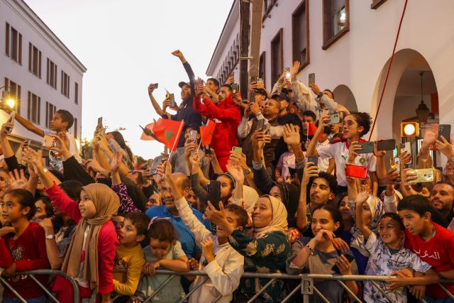 (251023) -- RABAT, Oct. 23, 2025 (Xinhua) -- Crowds celebrate during a parade celebrating Morocco winning the U20 World Cup in Rabat, Morocco, Oct. 22, 2025. (Xinhua/Huo Jing)