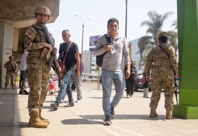 (251023) -- LIMA, Oct. 23, 2025 (Xinhua) -- Service women patrol the La Cultura metro station in Lima, Peru, on Oct. 22, 2025. Peruvian President Jose Jeri declared on Tuesday a 30-day state of emergency for the capital Lima and the neighboring Callao region to tackle worsening public security. (Xinhua/Mariana Bazo)