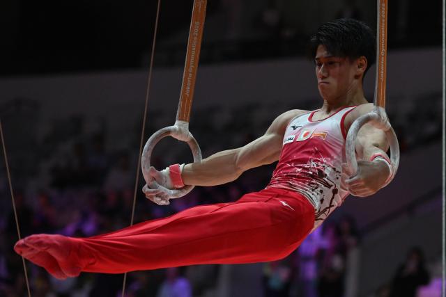 (251023) -- JAKARTA, Oct. 23, 2025 (Xinhua) -- Hashimoto Daiki of Japan competes on the rings during the Men's All-Around Final of the 53rd FIG World Artistic Gymnastics Championships at Indonesia Arena Stadium in Jakarta, Indonesia, Oct. 22, 2025. (Xinhua/Agung Kuncahya B.)