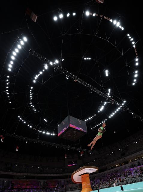 (251023) -- JAKARTA, Oct. 23, 2025 (Xinhua) -- Angelina Melnikova of AIN (Individual Neutral Athlete) competes during the Vault of the Women's All-Round Final at the 53rd FIG Artistic Gymnastics World Championships in Jakarta, Indonesia, on Oct. 23, 2025. (Xinhua/Bai Xuefei)