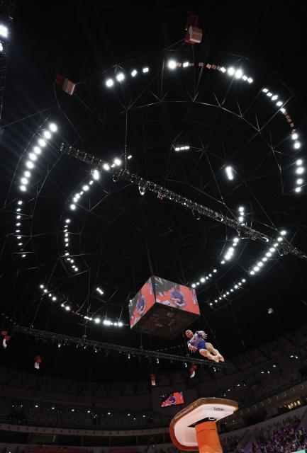 (251023) -- JAKARTA, Oct. 23, 2025 (Xinhua) -- Zhang Qingying of China competes during the Vault of the Women's All-Round Final at the 53rd FIG Artistic Gymnastics World Championships in Jakarta, Indonesia, on Oct. 23, 2025. (Xinhua/Bai Xuefei)