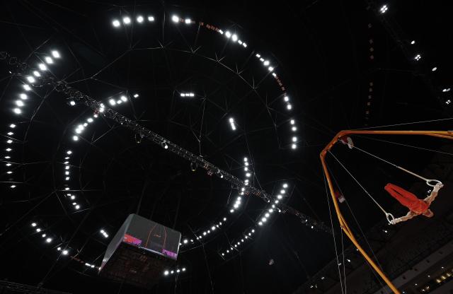 (251024) -- JAKARTA, Oct. 24, 2025 (Xinhua) -- Lan Xingyu of China competes during the Men's Rings Final at 53rd FIG Artistic Gymnastics World Championships in Jakarta, Indonesia, on Oct. 24, 2025. (Xinhua/Bai Xuefei)