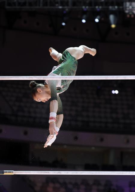 (251024) -- JAKARTA, Oct. 24, 2025 (Xinhua) -- Kaylia Nemour of Algeria competes during the Women's Uneven Bars Final at 53rd FIG Artistic Gymnastics World Championships in Jakarta, Indonesia, on Oct. 24, 2025. (Xinhua/Bai Xuefei)