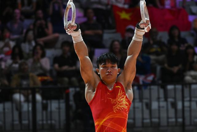 (251024) -- JAKARTA, Oct. 24, 2025 (Xinhua) -- Lan Xingyu of China competes during the Men's Rings Final at 53rd FIG Artistic Gymnastics World Championships in Jakarta, Indonesia, on Oct. 24, 2025. (Xinhua/Agung Kuncahya B.)