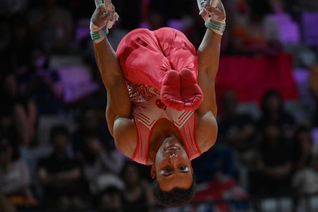 (251024) -- JAKARTA, Oct. 24, 2025 (Xinhua) -- Adem Asil of Türkiye competes during the Men's Rings Final at 53rd FIG Artistic Gymnastics World Championships in Jakarta, Indonesia, on Oct. 24, 2025. (Xinhua/Agung Kuncahya B.)