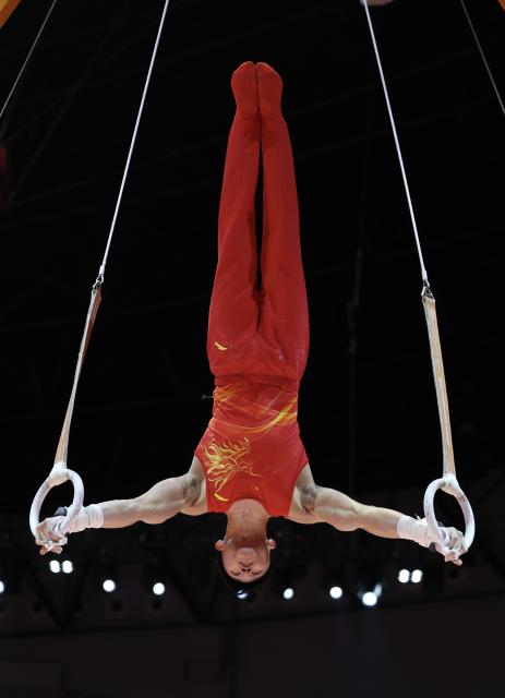 (251024) -- JAKARTA, Oct. 24, 2025 (Xinhua) -- Lan Xingyu of China competes during the Men's Rings Final at 53rd FIG Artistic Gymnastics World Championships in Jakarta, Indonesia, on Oct. 24, 2025. (Xinhua/Bai Xuefei)