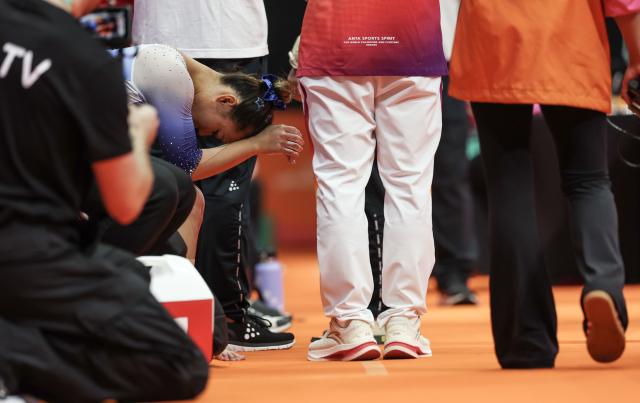 (251024) -- JAKARTA, Oct. 24, 2025 (Xinhua) -- Deng Yalan of China reacts during the Women's Vault Final at 53rd FIG Artistic Gymnastics World Championships in Jakarta, Indonesia, on Oct. 24, 2025. (Xinhua/Bai Xuefei)