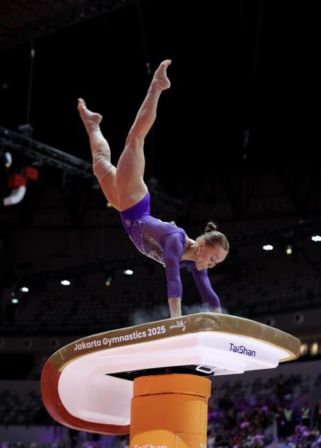 (251024) -- JAKARTA, Oct. 24, 2025 (Xinhua) -- Angelina Melnikova of AIN (Individual Neutral Athlete) competes during the Women's Vault Final at 53rd FIG Artistic Gymnastics World Championships in Jakarta, Indonesia, on Oct. 24, 2025. (Xinhua/Bai Xuefei)