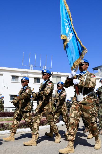 (251024) -- NAQOURA(LEBANON), Oct. 24, 2025 (Xinhua) -- The United Nations Interim Force in Lebanon (UNIFIL) holds a military parade at its headquarters in Naqoura, southern Lebanon, Oct. 24, 2025, marking the 80th anniversary of the founding of the United Nations. (Photo by Ali Hashisho/Xinhua)