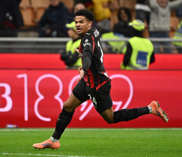 (251025) -- MILAN, Oct. 25, 2025 (Xinhua) -- AC Milan's Zachary Athekame celebrates his goal during a Serie A football match between AC Milan and Pisa in Milan, Italy, Oct. 24, 2025. (Photo by Alberto Lingria/Xinhua)