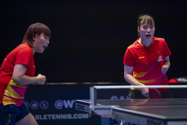 (251025) -- LONDON, Oct. 25, 2025 (Xinhua) -- Shi Xunyao (R)/Zhang Xiangyu celebrate during women's doubles quarterfinal between Shi Xunyao/Zhang Xiangyu of China and Adina Diaconu (Romania)/Maria Xiao (Spain) in the WTT Star Contender London 2025 in London, Britain, on Oct. 24, 2025. (Photo by Stephen Chung/Xinhua)