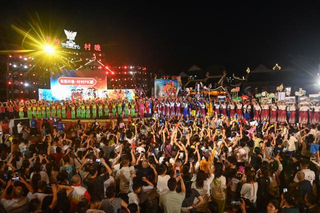 (251025) -- GUIYANG, Oct. 25, 2025 (Xinhua) -- A village gala is held in Songtao Miao Autonomous County, southwest China's Guizhou Province, on June 28, 2025. Nestled in the Wuling mountains, Songtao is home to a large Miao population -- nearly half of its residents -- and boasts around 200 items of intangible cultural heritage. To celebrate the county's rich ethnic traditions, the local government has organized weekly Saturday events since March, encouraging villagers from across the county to participate in friendly performance competitions.
   TO GO WITH "Across China: Village galas ignite ethnic heritage revival in southwest China" (Photo by Xie Huifang/Xinhua)