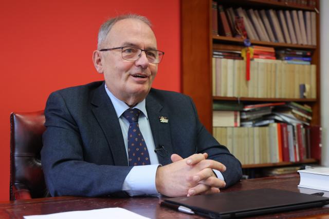 (251025) -- BUDAPEST, Oct. 25, 2025 (Xinhua) -- Gyula Thurmer, president of the Hungarian Workers' Party, speaks during an interview with Xinhua in Budapest, Hungary, Oct. 22, 2025. TO GO WITH "Interview: China's governance model offers insights to world, says expert" (Photo by Attila Volgyi/Xinhua)