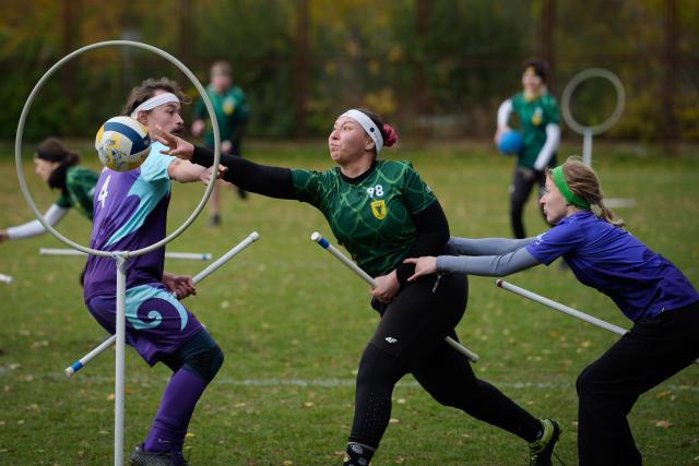 (251026) -- WARSAW, Oct. 26, 2025 (Xinhua) -- Players compete during the Polish qualifiers for the European Quadball Cup in Warsaw, Poland, Oct. 25, 2025. Quadball, originally inspired by Quidditch in the 'Harry Potter' series, combines elements of rugby, handball, water polo and dodgeball. (Photo by Jaap Arriens/Xinhua)