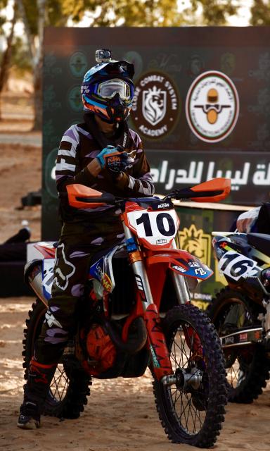 (251026) -- TRIPOLI, Oct. 26, 2025 (Xinhua) -- A motorcyclist participates in a motocross race in Tripoli, Libya on Oct. 24, 2025. To promote motocross culture and cultivate sportsmanship among local youth, the Libyan Motorcycle Association held the first Motocross Championship in Libya from Friday to Sunday. (Photo by Hazem Turkia/Xinhua)