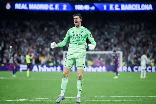 (251027) -- MADRID, Oct. 27, 2025 (Xinhua) -- Real Madrid's goalkeeper Thibaut Courtois celebrates his team's goal during the La Liga football match between Real Madrid and FC Barcelona at Santiago Bernabeu Stadium in Madrid, Spain, on Oct. 26, 2025. (Photo by Gustavo Valiente/Xinhua)