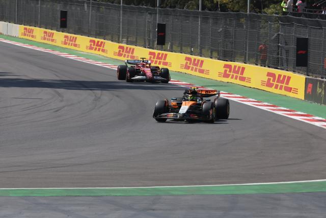 (251027) -- MEXICO CITY, Oct. 27, 2025 (Xinhua) -- McLaren's British driver Lando Norris (front) competes during the Formula One Mexico Grand Prix at the Hermanos Rodriguez Circuit in Mexico City, Mexico, Oct. 26, 2025. (Xinhua/Li Mengxin)