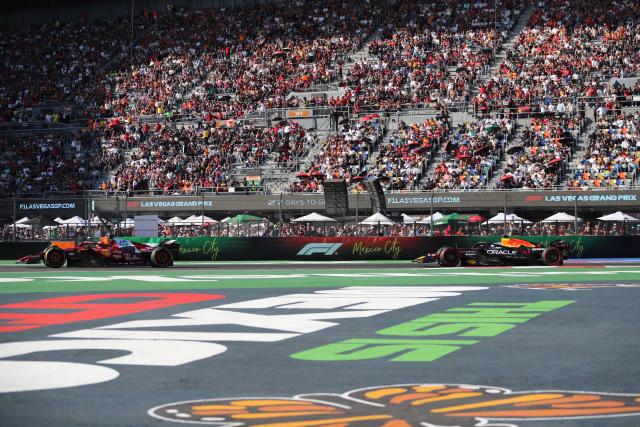 (251027) -- MEXICO CITY, Oct. 27, 2025 (Xinhua) -- Ferrari's Monegasque driver Charles Leclerc (L) and Red Bull's Dutch driver Max Verstappen compete during the Formula One Mexico Grand Prix at the Hermanos Rodriguez Circuit in Mexico City, Mexico, Oct. 26, 2025. (Xinhua/Li Mengxin)
