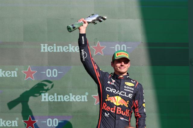 (251027) -- MEXICO CITY, Oct. 27, 2025 (Xinhua) -- Third-placed Red Bull's Dutch driver Max Verstappen attends the awarding ceremony for the Formula One Mexico Grand Prix at the Hermanos Rodriguez Circuit in Mexico City, Mexico, Oct. 26, 2025. (Xinhua/Li Mengxin)