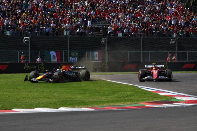(251027) -- MEXICO CITY, Oct. 27, 2025 (Xinhua) -- Red Bull's Dutch driver Max Verstappen (L) races off the track during the Formula One Mexico Grand Prix at the Hermanos Rodriguez Circuit in Mexico City, Mexico, Oct. 26, 2025. (Photo by Song Haiyuan/Xinhua)