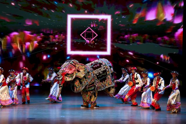 (251027) -- YANGON, Oct. 27, 2025 (Xinhua) -- Artists perform during the grand finals and award ceremony of Myanmar's Chinese song competition at the National Theater in Yangon, Myanmar, Oct. 26, 2025. TO GO WITH "Feature: Melodies of friendship -- Chinese song contest strengthens cultural bonds in Yangon" (Xinhua/Myo Kyaw Soe)