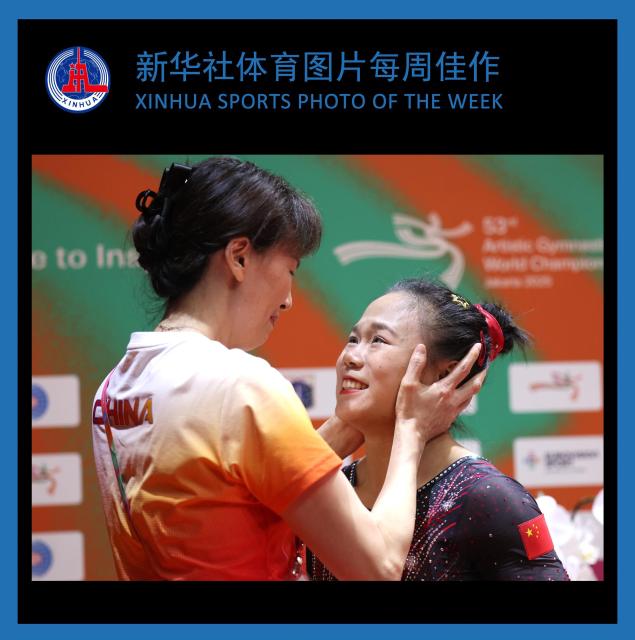 (251027) -- BEIJING, Oct. 27, 2025 (Xinhua) -- XINHUA SPORTS PHOTO OF THE WEEK (from Oct. 20 to Oct. 26, 2025) TRANSMITTED on Oct. 27, 2025. Zhang Qingying (R) of China celebrates with her coach Xu Jinglei after winning the women's balance beam final at 53rd FIG Artistic Gymnastics World Championships in Jakarta, Indonesia, Oct. 25, 2025. (Xinhua/Bai Xuefei)