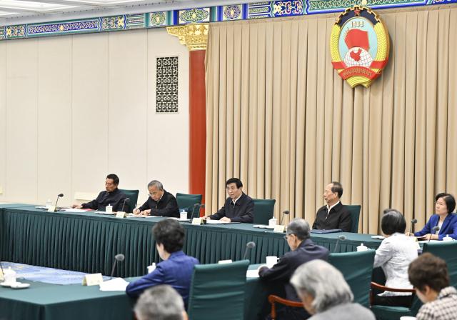 (251027) -- BEIJING, Oct. 27, 2025 (Xinhua) -- Wang Huning, a member of the Standing Committee of the Political Bureau of the Communist Party of China Central Committee and chairman of the Chinese People's Political Consultative Conference (CPPCC) National Committee, presides over and addresses a meeting of the Chairperson's Council of the CPPCC National Committee in Beijing, capital of China, Oct. 27, 2025. (Xinhua/Yue Yuewei)