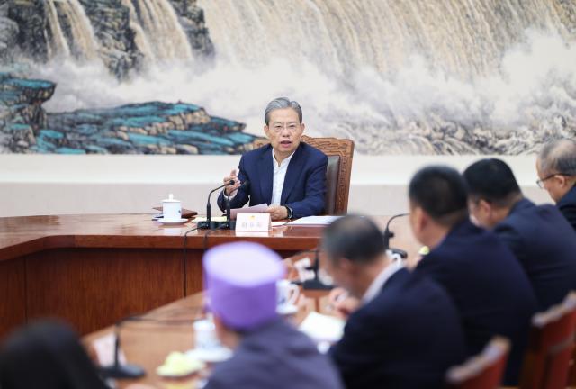 (251027) -- BEIJING, Oct. 27, 2025 (Xinhua) -- Zhao Leji, a member of the Standing Committee of the Political Bureau of the Communist Party of China (CPC) Central Committee and chairman of the National People's Congress (NPC) Standing Committee, speaks at a meeting with NPC deputies who are sitting in on the ongoing session of the NPC Standing Committee on Oct. 27, 2025. (Xinhua/Liu Bin)