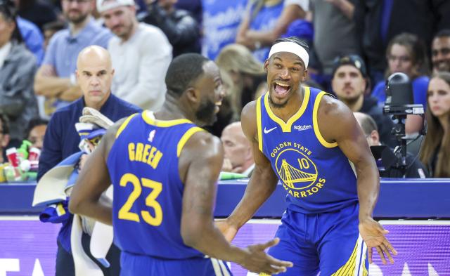 (251028) -- SAN FRANCISCO, Oct. 28, 2025 (Xinhua) -- Jimmy Butler III (R) and Draymond Green of Golden State Warriors celebrate scoring during the 2025-2026 NBA regular season match between Golden State Warriors and Memphis Grizzlies in San Francisco, the United States, on Oct. 27, 2025. (Photo by Arthur Dong/Xinhua)