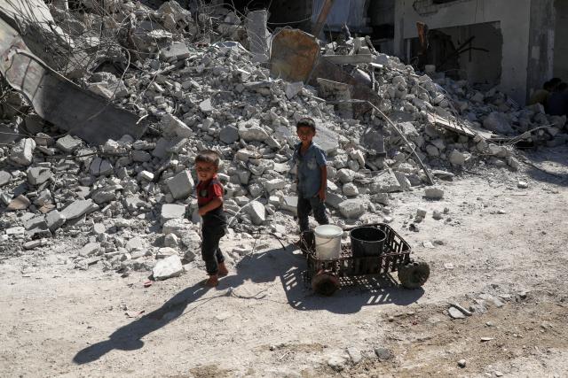 (251028) -- GAZA, Oct. 28, 2025 (Xinhua) -- Palestinians fetch water in the Shati refugee camp, west of Gaza City, Oct. 28, 2025. Palestinians may have to wait hours for a small amount of water, which is largely unavailable due to damage to water networks caused by Israeli bombing during the war. (Photo by Rizek Abdeljawad/Xinhua)