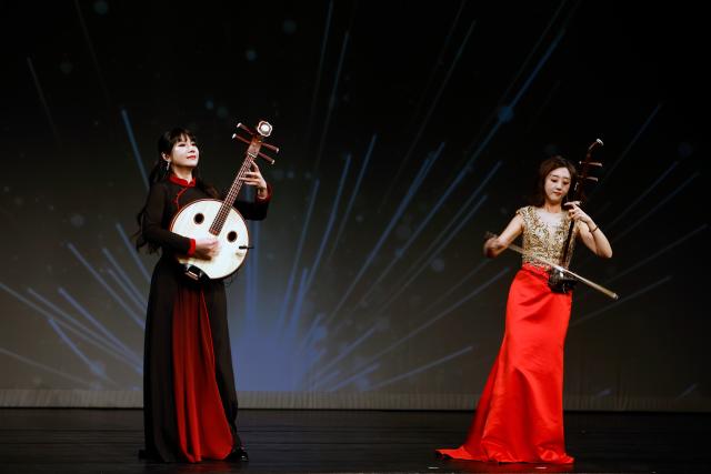 (251029) -- BUCHAREST, Oct. 29, 2025 (Xinhua) -- The "Embrace China--Beijing Sentiments" cultural performance is staged in Bucharest, Romania, Oct. 28, 2025. (Photo by Cristian Cristel/Xinhua)