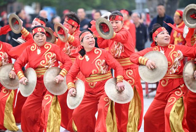 (251029) -- BEIJING, Oct. 29, 2025 (Xinhua) -- A local gong and drum team performs during an event celebrating Chongyang Festival in Xiping County, central China's Henan Province, Oct. 29, 2025. A series of celebration activities were held across the country to mark Chongyang Festival, which falls on Oct. 29 this year. Also known as China's Seniors' Day, it honors the country's traditional virtues of filial piety and family love. (Xinhua/Li Jianan)