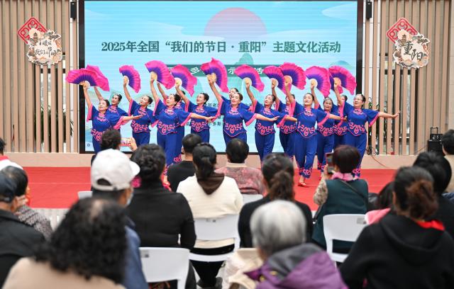 (251029) -- ERDOS, Oct. 29, 2025 (Xinhua) -- Residents perform dance to mark the Chongyang Festival at a community in Erdos, north China's Inner Mongolia Autonomous Region, Oct. 29, 2025. The Double Ninth Festival, also known as the Chongyang Festival, celebrated on the ninth day of the ninth lunar month, falls on Wednesday this year. It is an occasion to care for and send blessings to older people in China. (Xinhua/Bei He)