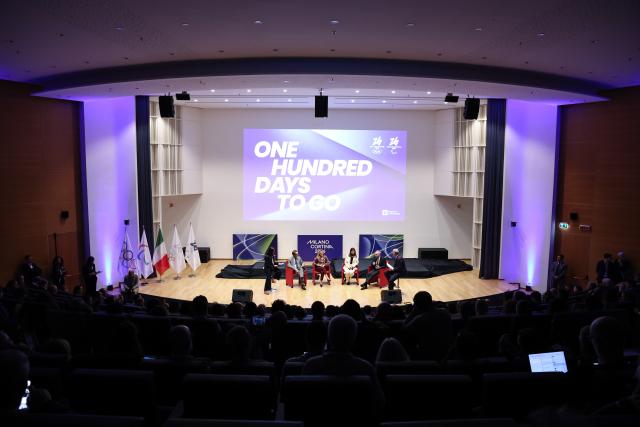 (251030) -- MILAN, Oct. 30, 2025 (Xinhua) -- Invited guests speak during a ceremony marking 100 days to the opening of the Milano-Cortina 2026 Olympic Winter Games at Palazzo Lombardia in Milan, Italy, Oct. 29, 2025. 
A ceremony marking 100 days to the opening of the Milano-Cortina 2026 Olympic Winter Games was held at Palazzo Lombardia in Milan, where organizers unveiled the official podiums for the Olympic and Paralympic Games and introduced 12 "digital torchbearers", symbolizing the start of the final stage of preparations for the event. (Xinhua/Li Jing)