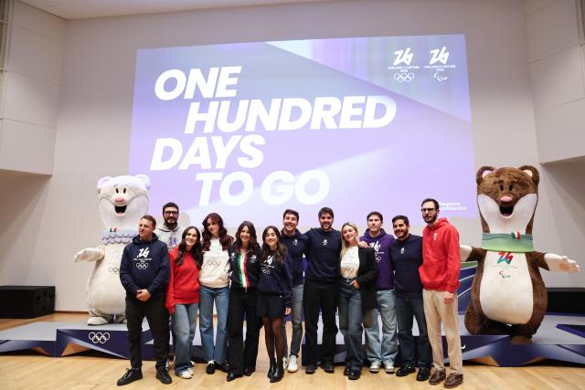 (251030) -- MILAN, Oct. 30, 2025 (Xinhua) -- Twelve "digital torchbearers" pose with Milano-Cortina 2026 Olympic and Paralympic Games mascots Tina and Milo, along with newly unveiled podiums during a ceremony marking 100 days to the opening of the Milano-Cortina 2026 Olympic Winter Games at Palazzo Lombardia in Milan, Italy, Oct. 29, 2025. 
A ceremony marking 100 days to the opening of the Milano-Cortina 2026 Olympic Winter Games was held at Palazzo Lombardia in Milan, where organizers unveiled the official podiums for the Olympic and Paralympic Games and introduced 12 "digital torchbearers", symbolizing the start of the final stage of preparations for the event. (Xinhua/Li Jing)