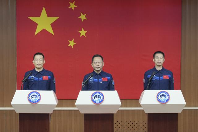 (251030) -- JIUQUAN, Oct. 30, 2025 (Xinhua) -- Chinese astronauts Zhang Lu (C), Wu Fei (R) and Zhang Hongzhang for the upcoming Shenzhou-21 spaceflight mission, meet the press in Jiuquan Satellite Launch Center in northwest China on Oct. 30, 2025. (Xinhua/Li Minggang)