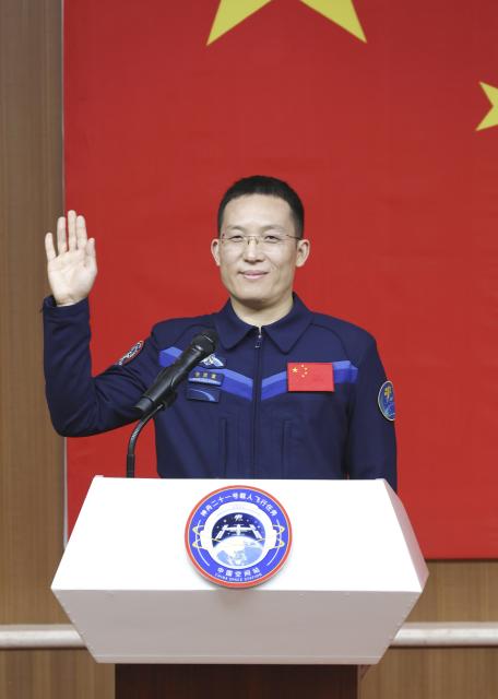 (251030) -- JIUQUAN, Oct. 30, 2025 (Xinhua) -- Chinese astronaut Zhang Hongzhang for the upcoming Shenzhou-21 spaceflight mission meets the press in Jiuquan Satellite Launch Center in northwest China on Oct. 30, 2025. Chinese astronauts Zhang Lu, Wu Fei and Zhang Hongzhang for the upcoming Shenzhou-21 spaceflight mission, met the press on Thursday. (Photo by Wang Jiangbo/Xinhua)