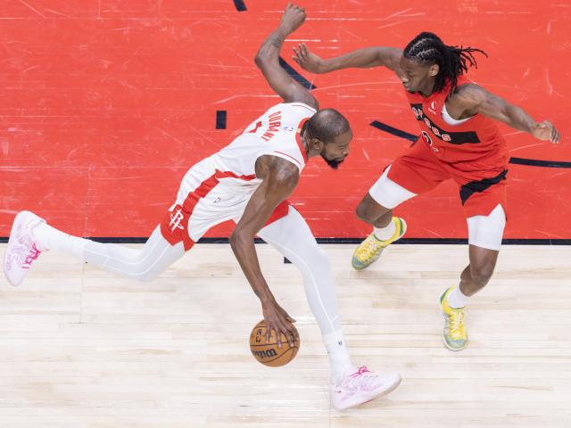 (251030) -- TORONTO, Oct. 30, 2025 (Xinhua) -- Kevin Durant (L) of Houston Rockets breaks through during the 2025-2026 NBA regular season game between Toronto Raptors and Houston Rockets in Toronto, Canada, on Oct. 29, 2025. (Photo by Zou Zheng/Xinhua)