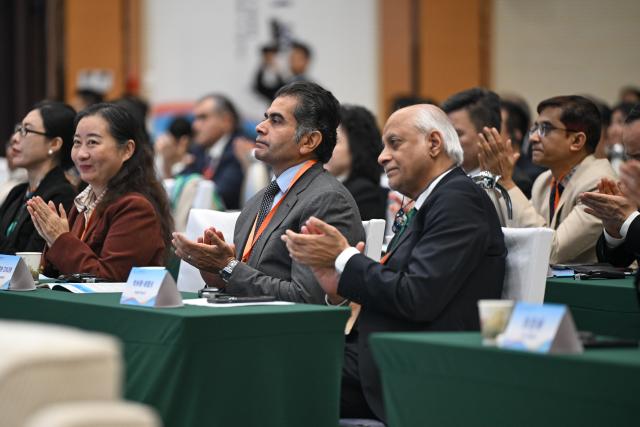 (251030) -- KASHGAR, Oct. 30, 2025 (Xinhua) -- Guests attend the China (Kashgar) - Central and South Asia Forum on the Rule of Law (2025) in Kashgar, northwest China's Xinjiang Uygur Autonomous Region, Oct. 30, 2025. The forum kicked off here on Thursday. (Xinhua/Ding Lei)