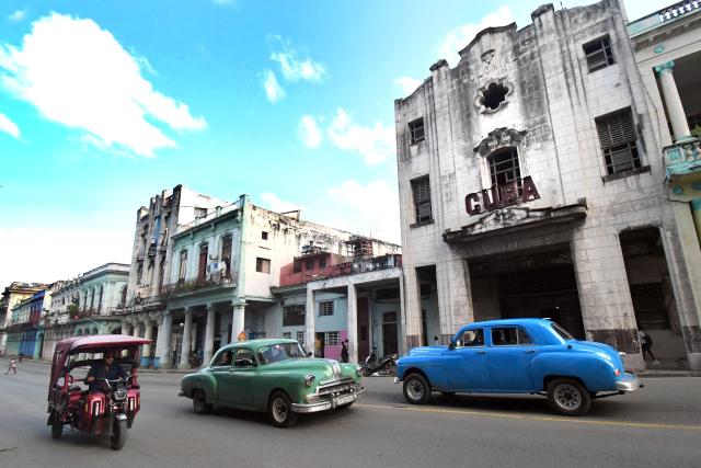 (251030) -- HAVANA, Oct. 30, 2025 (Xinhua) -- Vintage cars run at a street in Havana, capital of Cuba, on Oct. 29, 2025. The UN General Assembly (UNGA) adopted a draft resolution on Wednesday urging the United States to end its economic, commercial and financial embargo against Cuba. Since 1992, the UNGA has adopted by an overwhelming majority the non-binding annual resolution, urging the United States to end its embargo against Cuba imposed since 1962. (Photo by Joaquin Hernandez/Xinhua)
