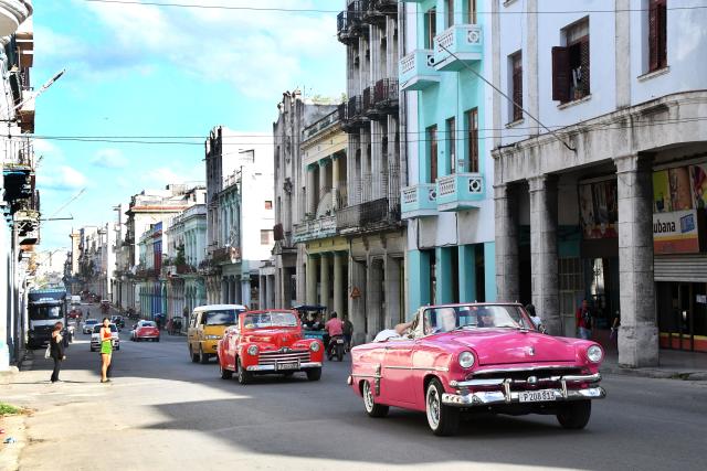 (251030) -- HAVANA, Oct. 30, 2025 (Xinhua) -- Vintage cars run at a street in Havana, capital of Cuba, on Oct. 29, 2025. The UN General Assembly (UNGA) adopted a draft resolution on Wednesday urging the United States to end its economic, commercial and financial embargo against Cuba. Since 1992, the UNGA has adopted by an overwhelming majority the non-binding annual resolution, urging the United States to end its embargo against Cuba imposed since 1962. (Photo by Joaquin Hernandez/Xinhua)