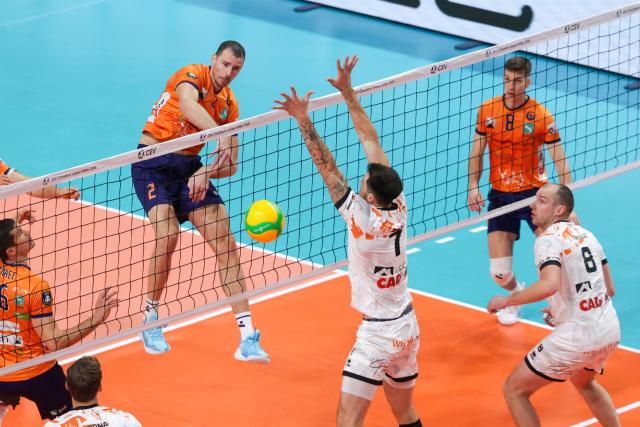 (251031) -- LJUBLJANA, Oct. 31, 2025 (Xinhua) -- Alen Pajenk (4th R) of ACH Ljubljana spikes the ball during the quarter-final second leg match between ACH Ljubljana and Orion Stars at the 2025/2026 CEV Champions League Men qualification round in Ljubljana, Slovenia, on Oct. 30, 2025. (Photo by Zeljko Stevanic/Xinhua)