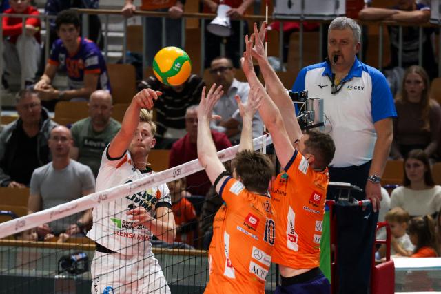 (251031) -- LJUBLJANA, Oct. 31, 2025 (Xinhua) -- Tobias Hougs Kjaer (L) of Orion Stars spikes the ball during the quarter-final second leg match between ACH Ljubljana and Orion Stars at the 2025/2026 CEV Champions League Men qualification round in Ljubljana, Slovenia, on Oct. 30, 2025. (Photo by Zeljko Stevanic/Xinhua)