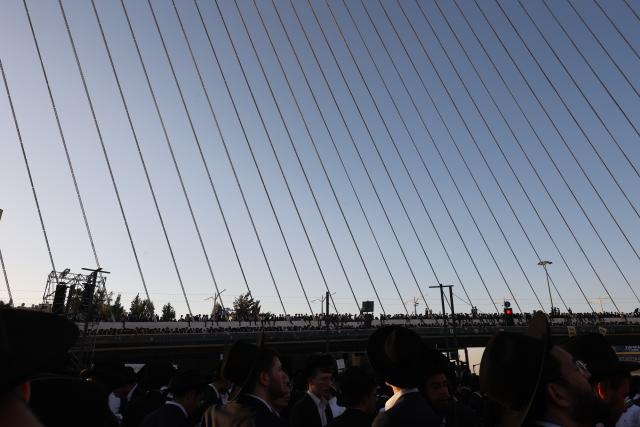 (251031) -- JERUSALEM, Oct. 31, 2025 (Xinhua) -- Ultra-Orthodox Jews take part in a protest in Jerusalem on Oct. 30, 2025. Hundreds of thousands of ultra-Orthodox Jews filled the streets of Jerusalem on Thursday to protest government plans to expand military conscription in their community and the recent arrests of draft dodgers by military police. (Photo by Gil Cohen Magen/Xinhua)